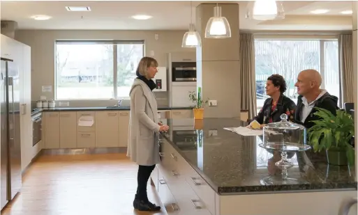  ??  ?? ABOVE / Ranui residents Lyn Hocquard (standing), Gillian Parker and John Hocquard love the clean, modern kitchen at Ranui. BELOW / Allison Nicol, CEO of the Bone Marrow Cancer Trust.