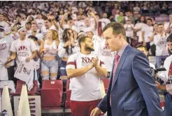  ?? ROBERTO E. ROSALES/JOURNAL ?? Paul Weir walks into the Pan Am Center for the first time as Lobos coach last Nov. 17. The former Aggies head coach lost to his old team, and the amount of the buyout he owes NMSU is still to be decided.