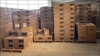  ?? PHOTO COURTESY OF OAKLAND COUNTY EMERGENCY MANAGEMENT ?? Boxes of face masks being stored at the Oakland County Emergency Operation Center’s personal protective equipment and vaccine supply warehouse in Bloomfield Township.