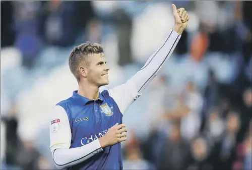  ?? PICTURE: STEVE ELLIS ?? THUMBS UP: Recent signing Joost van Aken salutes the Sheffield Wednesday fans after playing his part in their 3-1 win over Nottingham Forest on Saturday.