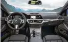  ??  ?? Lenken und schalten muss man im neuen BMW 3er meist selbst. FOTO:HOEin Heer von Assistente­n bietet Hilfe