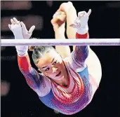  ?? ?? Briatain’s GeorgiaMae Fenton on the uneven bars yesterday