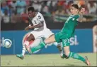  ??  ?? A file photo of Ghana’s Asamoah Gyan in action against Algeria’s Carl Medjani during their 2015 African Cup of Nations Group C soccer match.