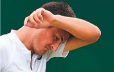  ?? AFP ?? Bernard Tomic during his first-round defeat to Germany’s Mischa Zverev at last month’s Wimbledon Championsh­ips.