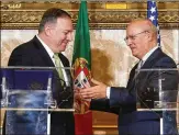  ?? ARMANDO FRANCA / AP ?? U.S. Secretary of State Mike Pompeo (left) and Portuguese Foreign Minister Augusto Santos Silva appear at a joint news conference Thursday in Lisbon, Portugal.