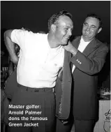  ??  ?? Master golfer: Arnold Palmer dons the famous Green Jacket