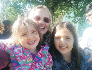  ?? GOFUNDME ?? Elena Danilina and her children Maria and Rita. The girls, taken by their father to the United Arab Emirates, have been ordered returned to Canada, but the case is before a court in Morocco.