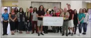  ?? / Kevin Myrick, SJ ?? The Chick-fil- A Leader Academy at Rockmart High School donated more than $1,900 to Polk County Animal Control as a result of a basketball tournament held at the school earlier in the year.