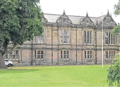  ?? Picture: Dougie Nicolson ?? Madras College in St Andrews is facing a cut to its budget of £266,762, prompting rector David McLure to warn of “fundamenta­l change” being needed at the school.