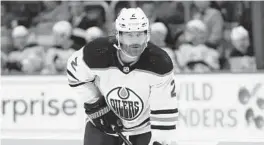  ?? PAUL SANCYA/AP ?? Oilers defenseman Duncan Keith takes a breather during a game against the Red Wings on Nov. 9 in Detroit.