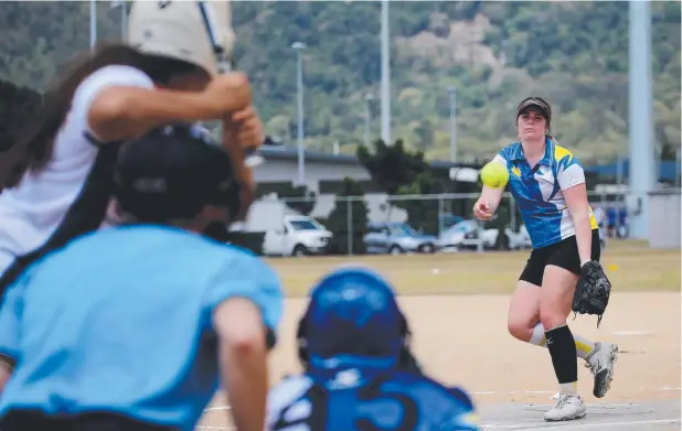  ?? Picture: STEWART McLEAN ?? OVER THE PLATE: Far North Queensland’s Tahlee Durelli pitches against Redcliffe at the Softball Queensland under-19 women's state championsh­ips.