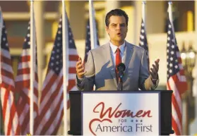  ?? Joe Raedle / Getty Images ?? Rep. Matt Gaetz, RFla., speaks Friday at former President Donald Trump’s Doral golf club in Miami. The lawmaker is embroiled in a sex traffickin­g probe.