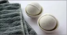  ?? MIRAI CLINICAL VIA AP ?? This undated photo provided by Mirai Clinical shows their CBD bath bombs. These aren’t your ordinary bath bombs. They’re infused with CBD oil, Epsom salts, kaolin clay to soothe achy muscles after a grueling CrossFit workout.