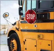  ?? SUBMITTED PHOTO ?? School buses will soon be sharing the roads with other vehicles as students begin a new school year.