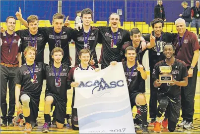  ?? SUBMITTED PHOTO ?? The Holland College Hurricanes celebrate the men’s team and school’s first Atlantic Collegiate Athletic Associatio­n volleyball title. Holland College defeated UNBSJ 3-0 in Sunday’s final in Truro, N.S. Members of the team are, front row, from left,...