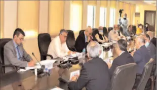  ??  ?? ISLAMABAD
Finance Minister Shaukat Tarin presides over a meeting of the Monetary and Fiscal Policies Coordinati­on Board.
-APP