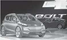  ?? TONY DING, AP ?? The Chevrolet Bolt EV has a range of 238 miles with a starting price of $ 37,495 before federal tax credits kick in.