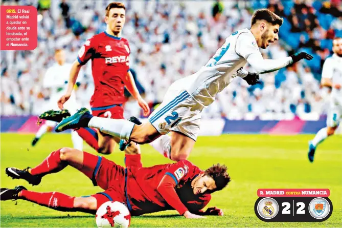  ??  ?? GRIS. El Real Madrid volvió a quedar en deuda ante su hinchada, el empatar ante el Numancia.