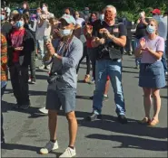  ?? MID-HUDSON NEWS NETWORK ?? Participan­ts in the Poughkeeps­ie, N.Y., ‘prayer walk’ on Sunday, June 7, 2020, applaud a speaker.