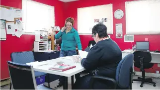  ?? MATHIEU BELANGER ?? Emmanuelle and Maureen Guthrie work at the St-Roch doctorless clinic in Quebec City on Monday. The pilot project will cease operations May 1 unless long-term funding is provided.