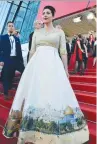  ?? (Twitter) ?? CULTURE AND SPORT Minister Miri Regev brings an image of Jerusalem on her dress to the Cannes Film Festival in France in May.