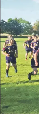  ??  ?? Lochaber’s Callum Boyd breaks out