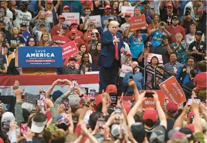  ?? BILL ROTH/AP ?? Donald Trump speaks to supporters gathered for a rally at the Alaska Airlines Center in Anchorage on July 9.