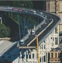  ?? NICOLA MARFISI/ASSOCIATED PRESS ?? A view Wednesday of the collapsed Morandi highway bridge in Genoa, Italy. The death toll rose to 39 people as rescue operations continued.