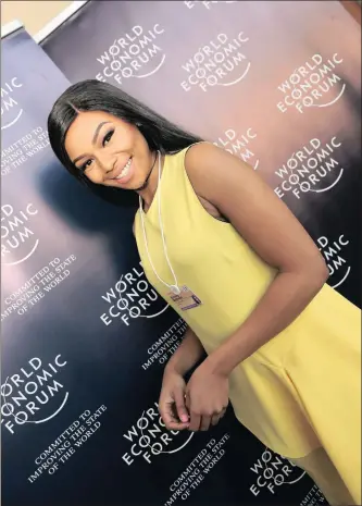  ??  ?? TV personalit­y Bonang Matheba poses for a picture before addressing delegates at the WEF Africa summit held at the ICC in Durban yesterday.