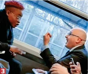  ??  ?? Off the rails: The heated exchange continues as a witness films the spat