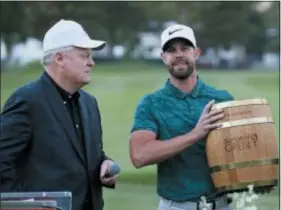  ?? ERIC RISBERG — THE ASSOCIATED PRESS ?? Broadcaste­r Johnny Miller, left, gets ready to interview Kevin Tway after Tway won the Safeway Open this month in Napa, Calif.