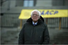  ?? MEG KINNARD- ASSOCIATED PRESS ?? Democratic presidenti­al candidate Sen. Bernie Sanders, I-Vt., stands at the South Carolina Statehouse before a Dr. Martin Luther King Jr. Day rally Monday, Jan. 20.