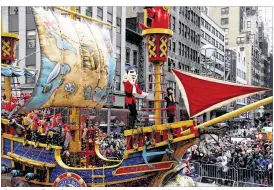 ??  ?? Thousands of people packed Sixth Avenue in New York City on Thursday to watch marching bands, colorful flfloats and celebritie­s in Macy’s Thanksgivi­ng Day Parade. TNS