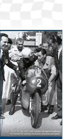  ??  ?? Ubbiali on the 250cc twin-cylinder MV Agusta at Monza, surrounded by adoring mechanics and team personnel.