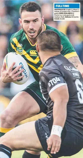  ?? Picture: TONY McDONOUGH ?? Australian fullback Darius Boyd confronts New Zealand five-eighth Thomas Leuluai last night during the first rugby league Test match played in Perth