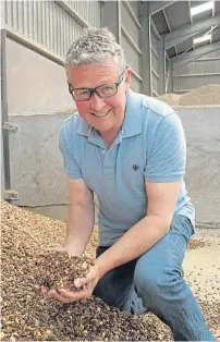  ??  ?? Developing the feed compoundin­g operation has been an effective way of adding value to the farm’s grain crops, says Andrew McFadzean.