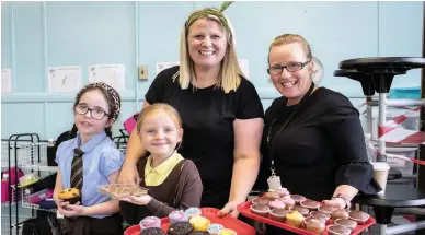 ??  ?? Icing on the cake Coatbridge school St Bernard’s Primary’s 2019 fundraiser went down a treat