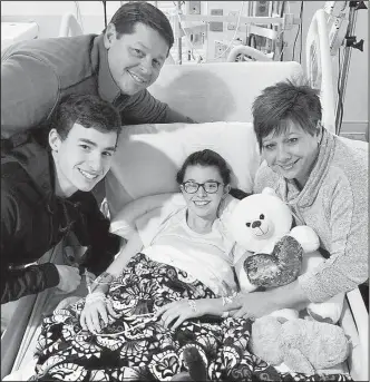  ?? Photograph submitted ?? Kennedy Allison is recovering at Arkansas Children’s Hospital in Little Rock after passing out at school Friday. Her parents, Keith and Jennifer Allison, and brother Landon are keeping her company.