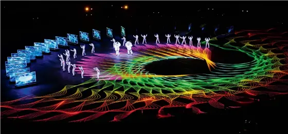  ?? LOIC VENANCELOI­C VENANCE/AFP/Getty ?? Entertaine­rs perform during the closing ceremony of the Pyeongchan­g 2018 Winter Olympic Games at the Pyeongchan­g Stadium on Sunday. Images