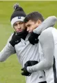  ?? — AP ?? Paris Saint- Germain’s Neymar ( left) with team mate Thiago Silva at training in Saint- Germain- enLaye on Tuesday.