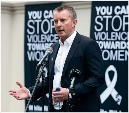  ?? GETTY ?? Mark Longley, a trustee of the anti-violence White Ribbon Trust, addresses a vigil for Grace Millane in December. His daughter Emily, below left, was murdered in the UK in 2011.