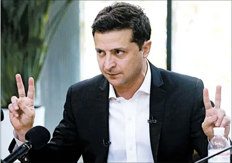  ?? EFREM LUKATSKY/AP ?? Ukrainian President Volodymyr Zelenskiy answers media questions Thursday in Kyiv.