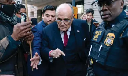  ?? ?? Rudy Giuliani leaves court in Washington on Friday. Photograph: José Luis Magaña/AP