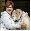  ?? RALPH BARRERA / AMERICAN-STATESMAN ?? Melissa Fiero, here with dog Zeke, was the lead organizer of last year’s Women’s March in Austin. She’ll speak at this year’s events.