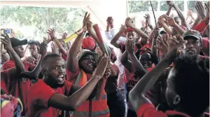  ?? / JACKIE CLAUSEN ?? EFF student members sing Struggle songs at the DUT campus where student Mlungisi Madonsela was shot and later died.