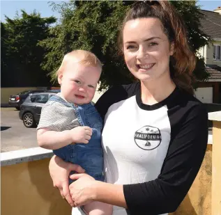  ?? Photo by Michelle Cooper Galvin. ?? A MOTHER’S LOVE: Selina Looney at home with one-year-old Theo Ashe in Killarney on Tuesday morning.