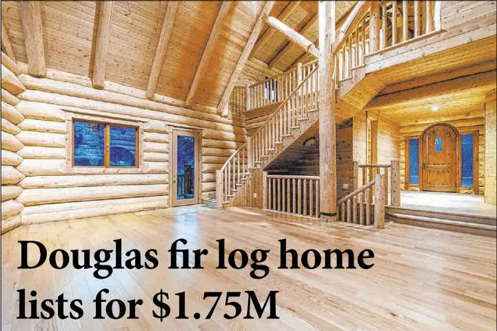  ?? Berkshire Hathaway Home Services ?? The owner purchased hand-hewn Douglas fir logs from a craftsman in Canada in 2007. It took more than seven months to create the logs to build the cabin.