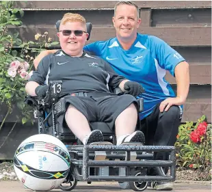  ?? Picture: Gareth Jennings. ?? Logan Mitchelson with his dad Gareth on the driveway pitch in Monifieth.