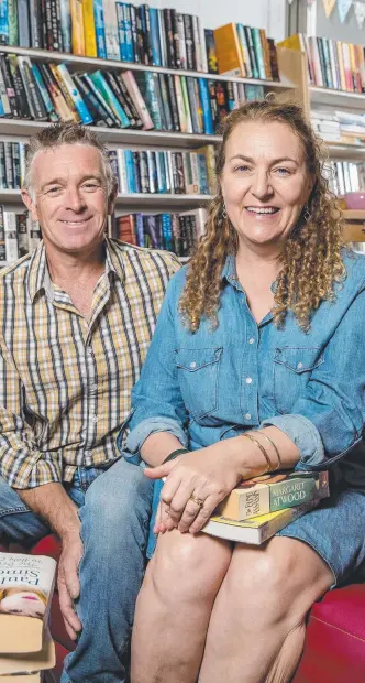  ??  ?? Nobby Beach Books owner Leah May, with husband John May, is closing her business.