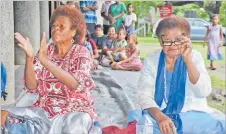  ?? Picture: Picture: REINAL CHAND ?? Left: Wife of former PM Laisenia Qarase Leba Qarase at the church service.
Litia Rorena (left) and Lia Volivakasi­ga at the thanksgivi­ng service held for the People’s Alliance, NFP and SODELPA coalition Government at the Girmit Centre in Lautoka.